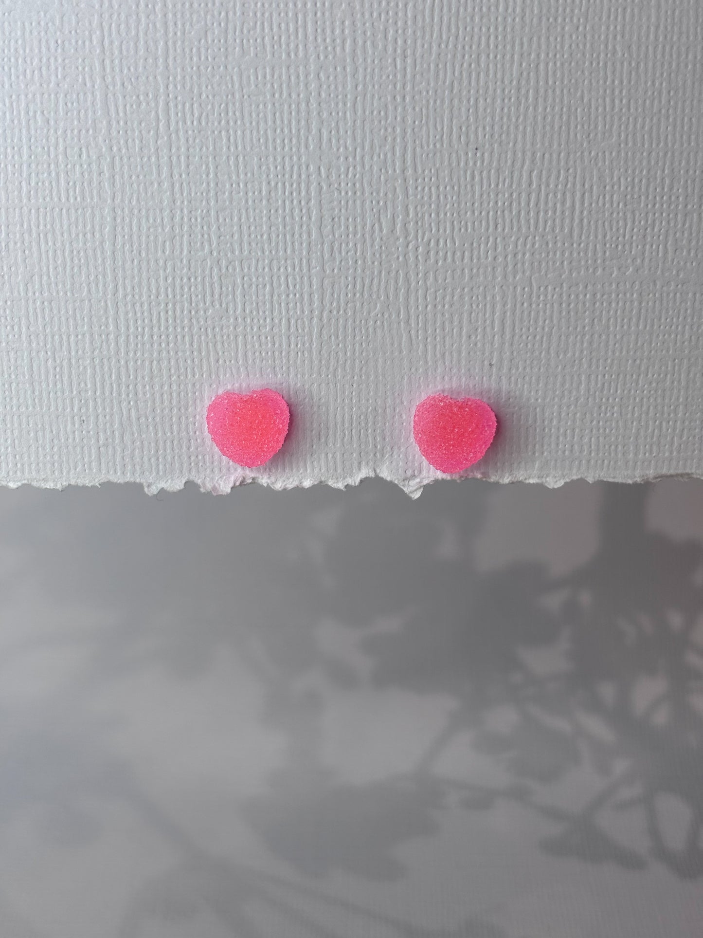 Pink gummy heart studs