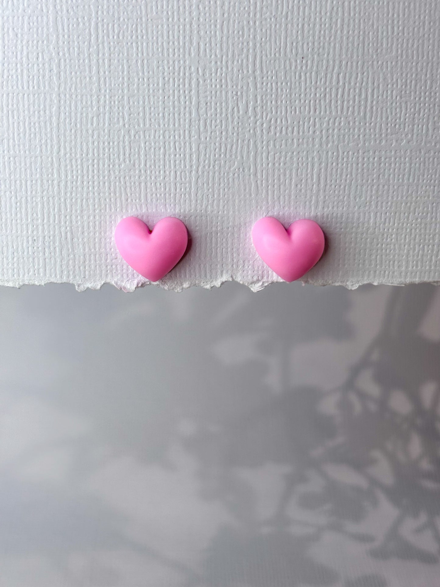 Pink heart studs