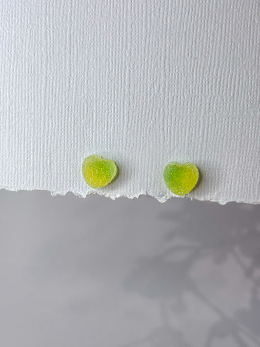 Green gummy heart studs