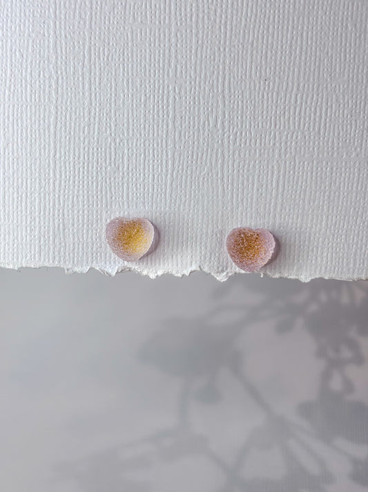 Purple gummy heart studs